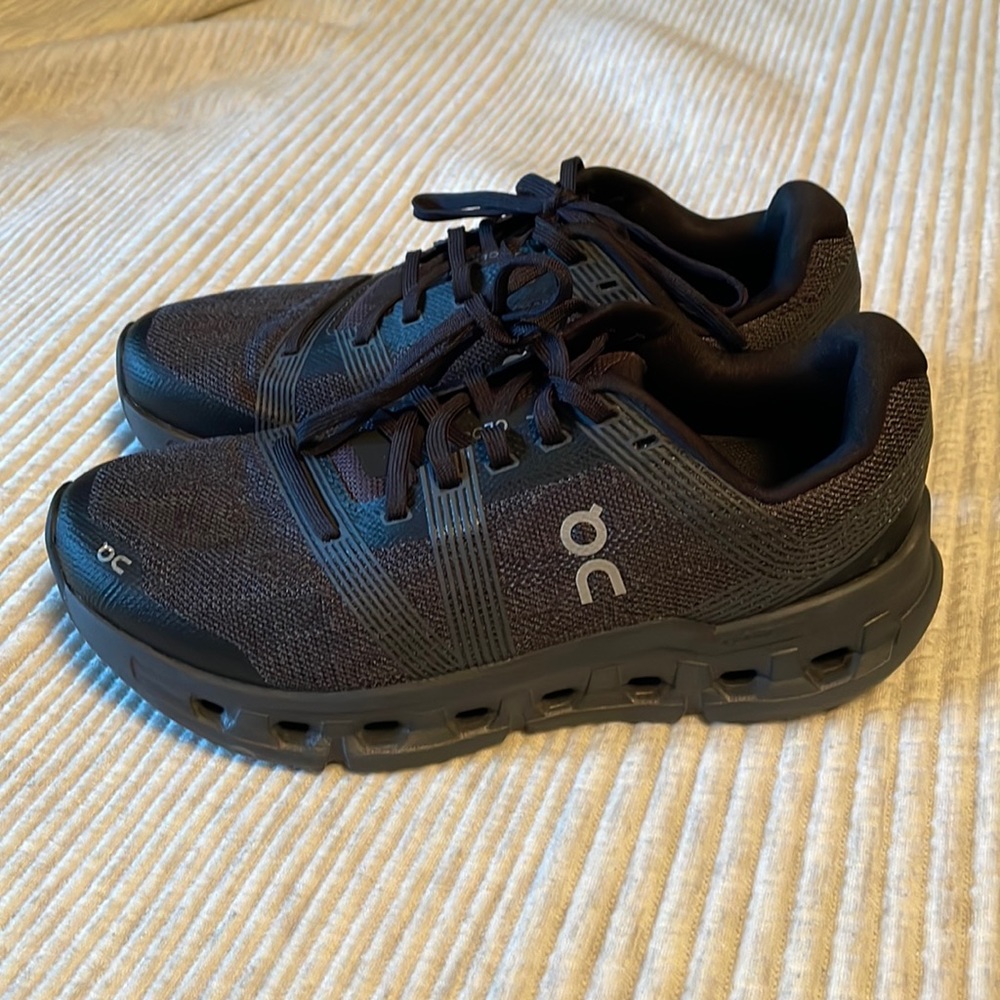 One pair of women’s black ON Cloud  size 7 1/2 shoes. Worn one time!